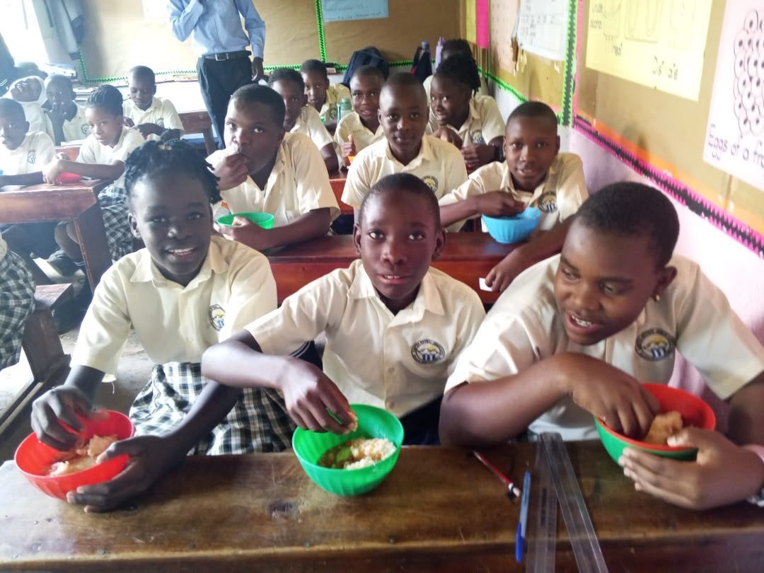 Students receiving warm daily meals